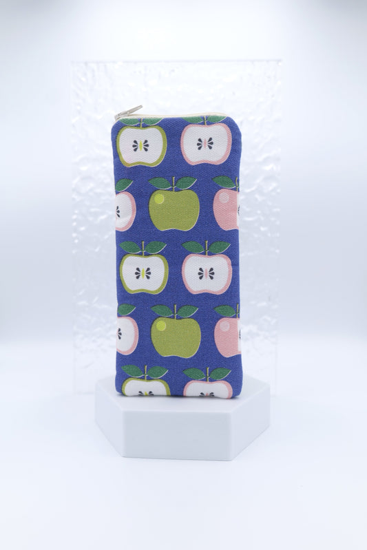 Glasses case featuring the Apples design with retro style apples in green, pink, and white  on a dark blue background; made from cotton canvas with a zip-top closure, padded and lined to protect lenses, handmade in Melbourne.