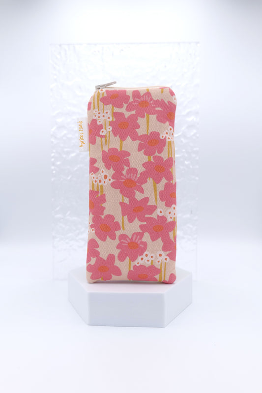 Blush Flowers Glasses Case with pink flowers in a flat illustrated style and white accents, on a soft beige background; handmade in Melbourne from cotton canvas, padded and lined with cotton, glasses case has a zip top and certified Australian made