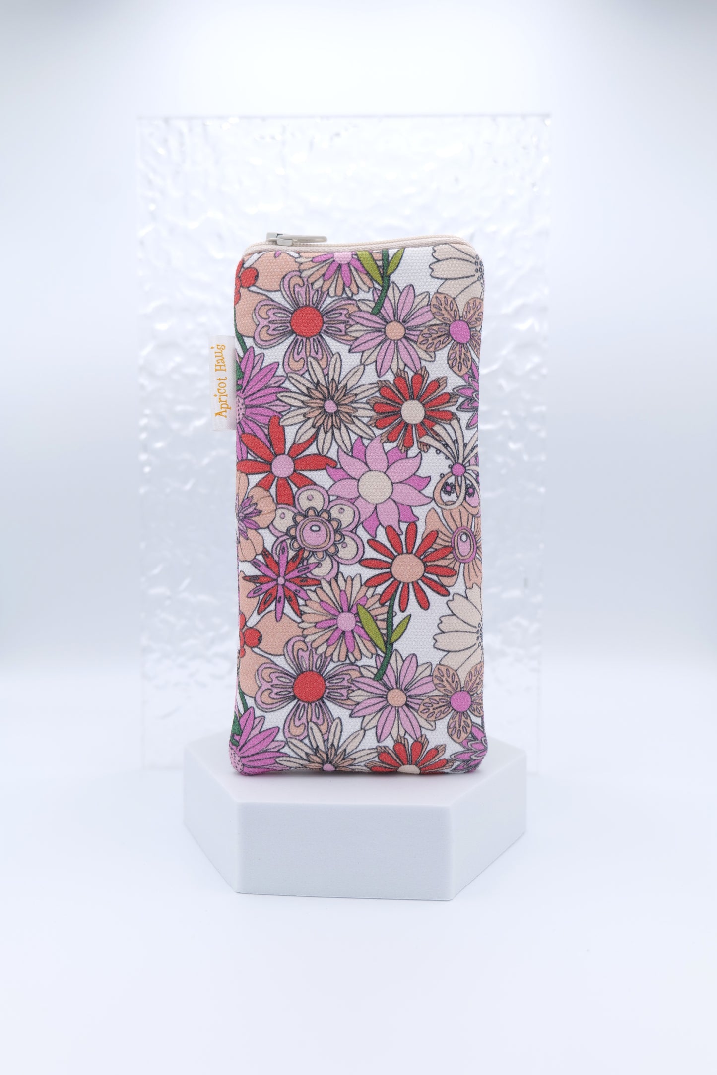 Glasses case featuring Chelsea Nude design, a retro-inspired, nude‑toned floral arrangement on cotton canvas; made with a zip‑top closure, padded and lined to protect lenses, handmade in Melbourne and certified Australian Made; pattern placement may vary slightly due to the handmade nature of the product.