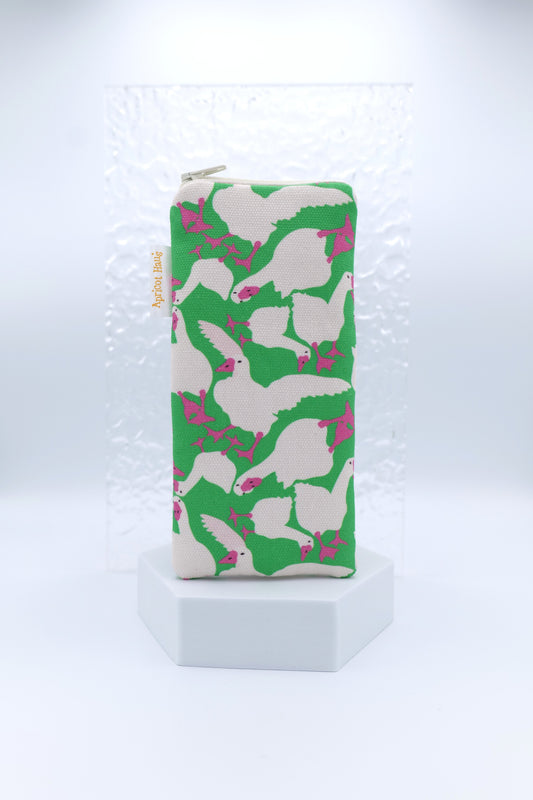 Glasses case featuring Geese design with cute white geese, hot pink beaks and feet, set against a bright green background; made from cotton canvas with a zip‑top closure, padded and lined to protect lenses, handmade in Melbourne and certified Australian Made; pattern placement may vary slightly due to the handmade nature of the product.