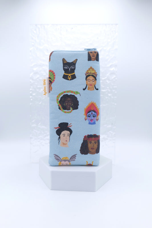 Glasses case featuring the Goddesses Around the World design with illustrated mythological female figures from diverse cultures on a pale blue background; made from cotton canvas with a zip-top closure, padded and lined to protect lenses, handmade in Melbourne and certified Australian Made; pattern placement may vary slightly due to the handmade nature of the product.