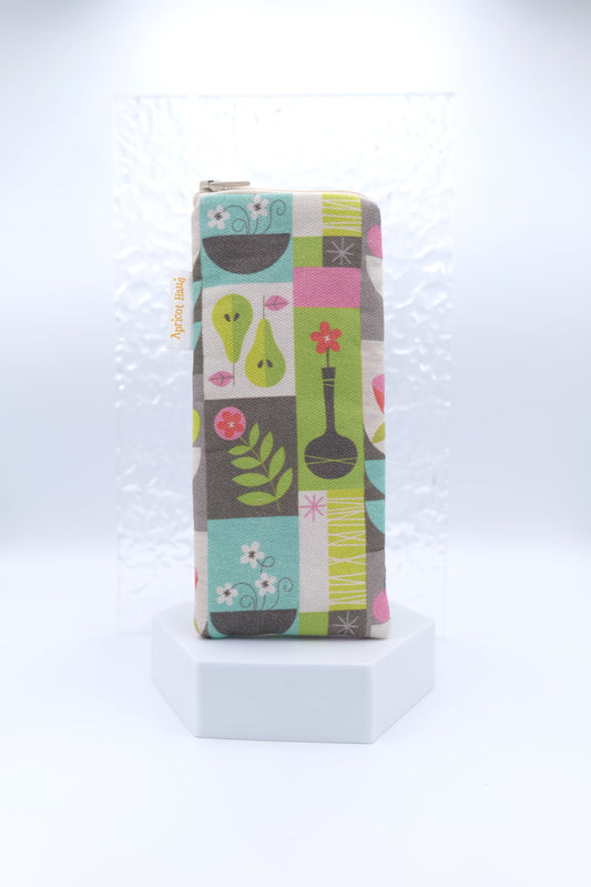 Glasses case featuring the Scandi Mod Patchwork design with stylised pears, flowers, leaves, and abstract shapes in green, pink, turquoise, grey and white on a soft grid layout; Scandinavian patchwork style with mid-century design elements; made from cotton canvas with a zip-top closure, padded and lined to protect lenses, handmade in Melbourne and certified Australian Made; pattern placement may vary slightly due to the handmade nature of the product.