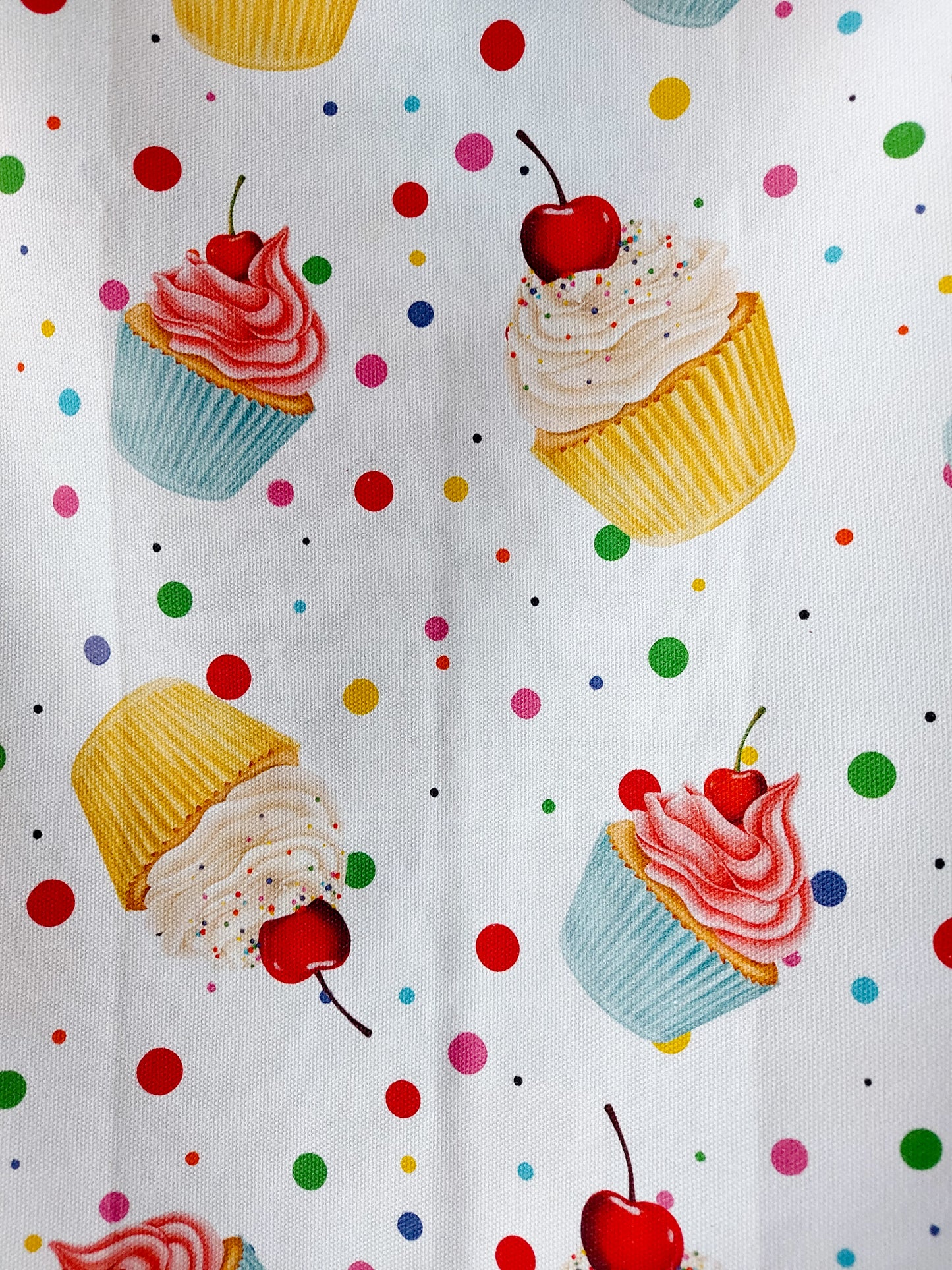 Close up photo of the cupcakes featured on the Tumbling Cupcakes tea towel
